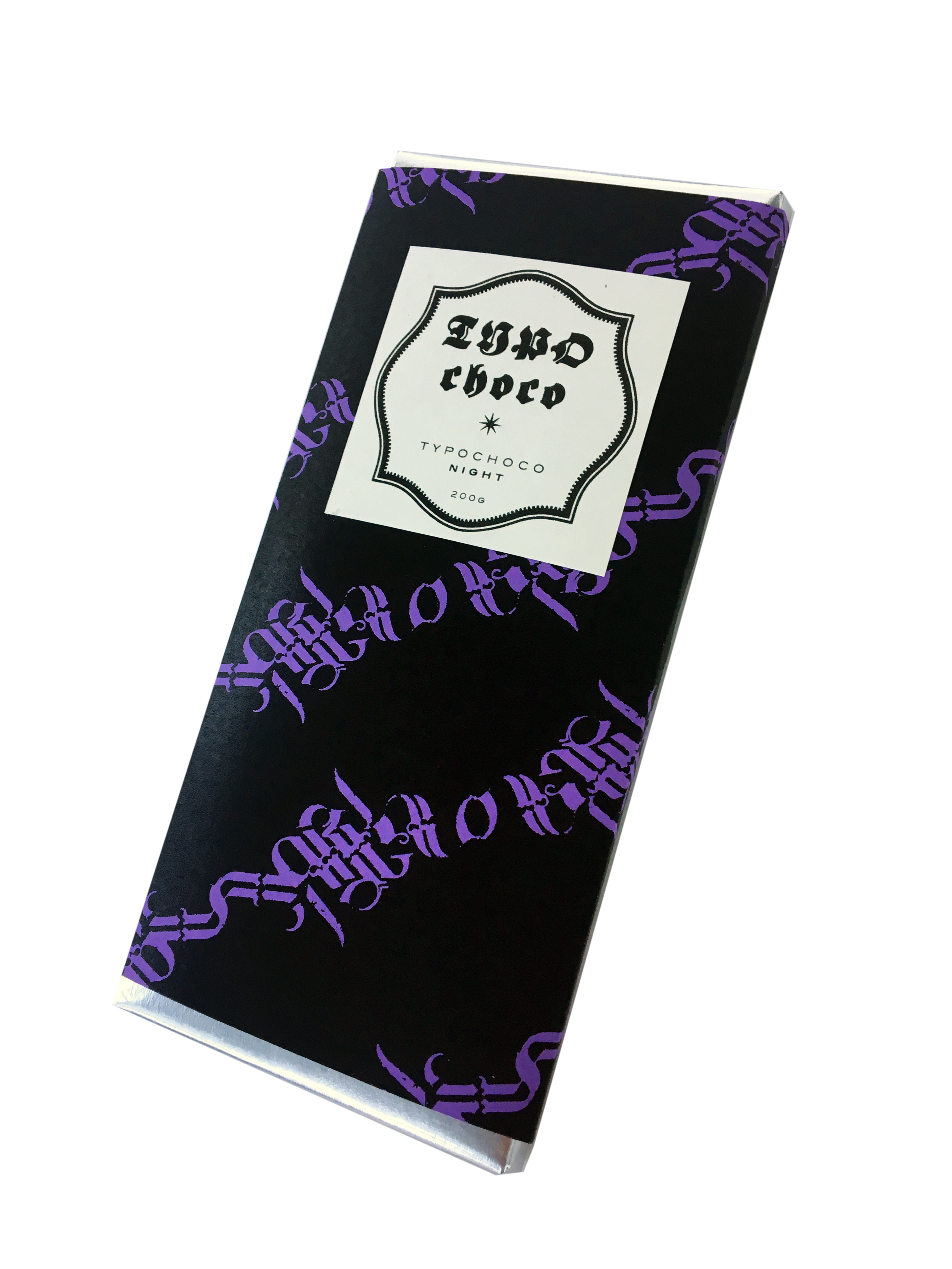 A white background with a sleeve of chocolate. The packaging of the chocolate is purple and black.